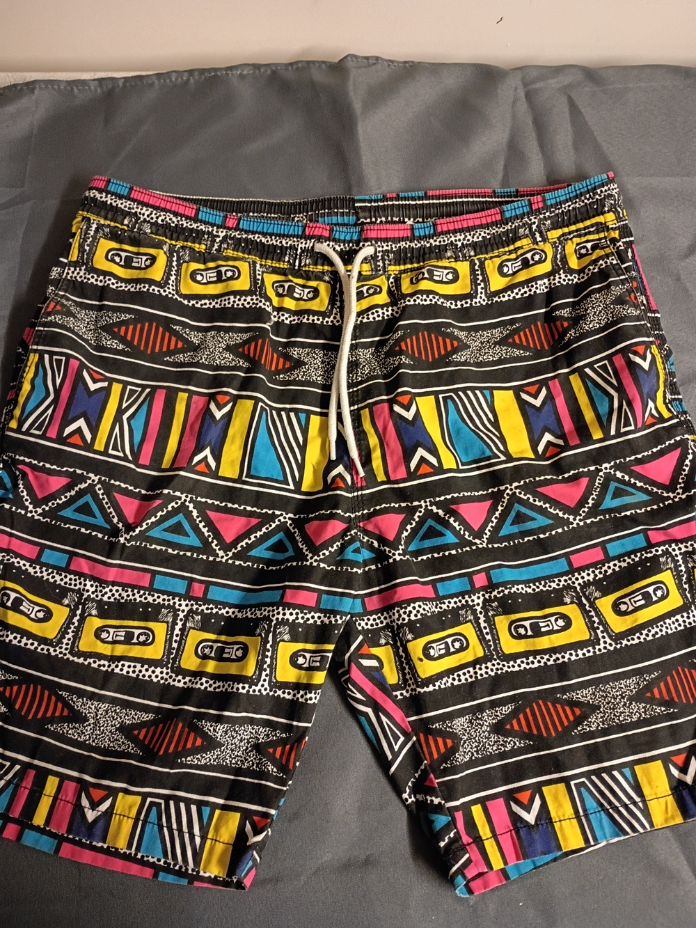Divided Black 90s Feel Shorts with Yellow, Blue & Pink Accents
